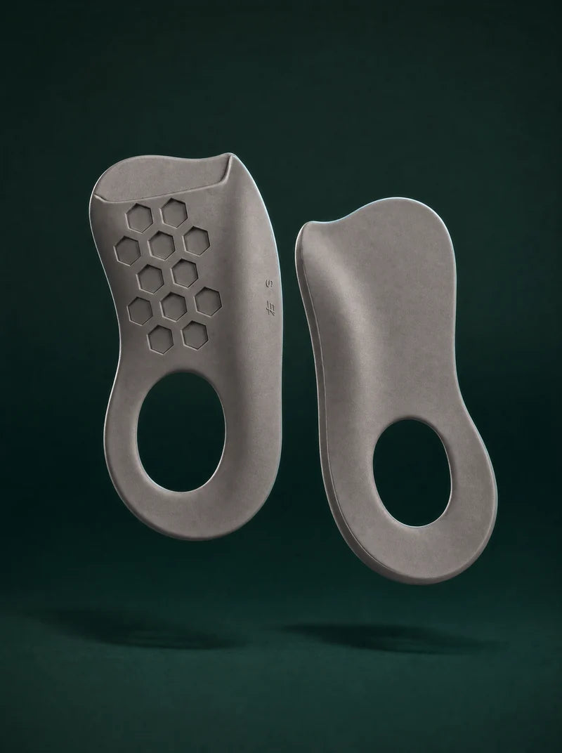 Gray three-quarter arch support inserts, top and underside studio views